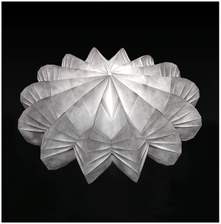 Illustration for article titled Beautiful Light Fixtures Folded From A Single Sheet Of Tyvek